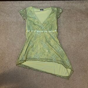 Lime green lacy, asymmetrical top. Vanity size xs